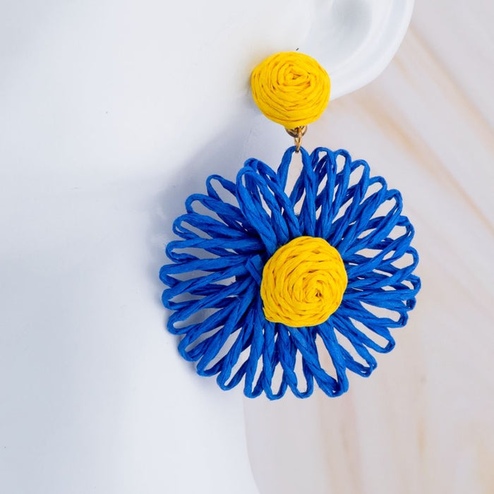 Aretes flor junco baño 18k