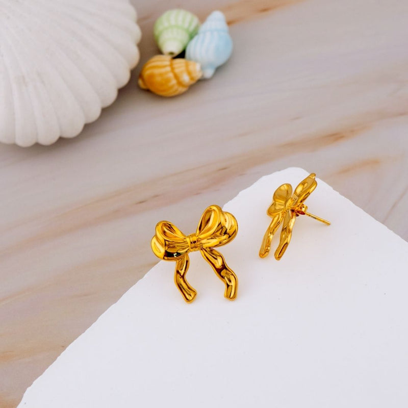 Aretes stud coquette acero inoxidable prueba de agua