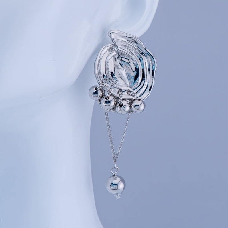 Aretes chunky caracol con de bolitas colgantes baño 18K