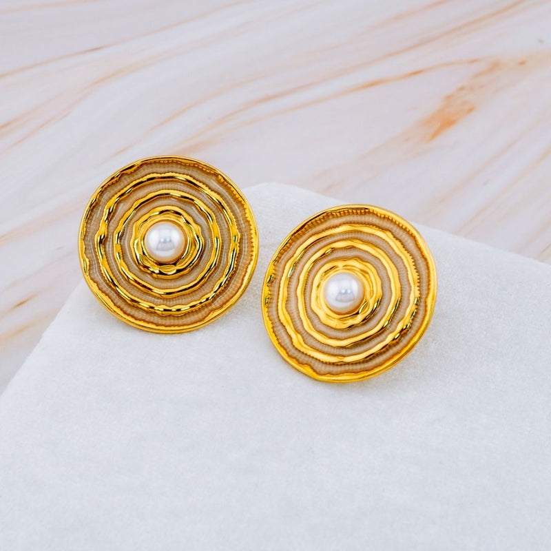 Aretes caracol acero inoxidable y perla.