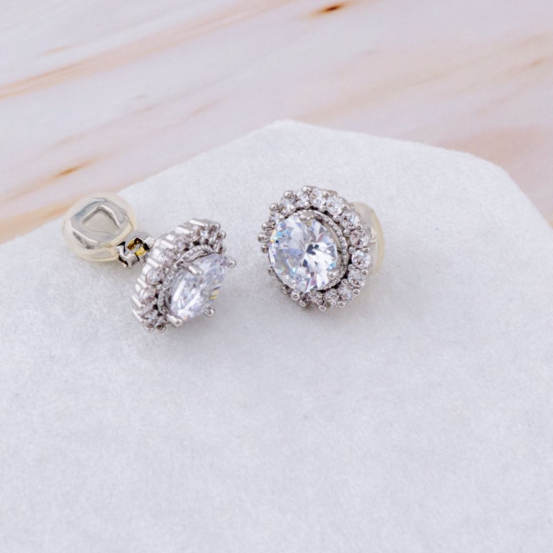 Aretes stud a presion con zirconias baño 18k