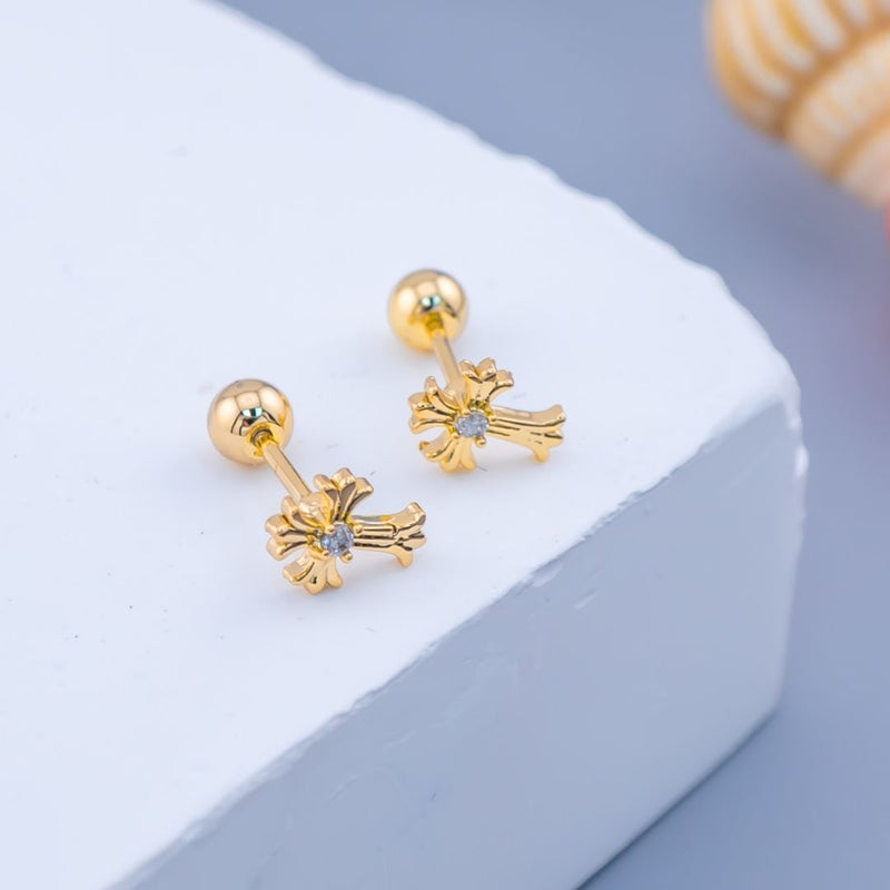 Aretes piercing en forma de cruz con zirconia baño 18k