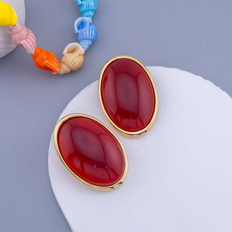 Aretes ovalados con piedras baño 18k