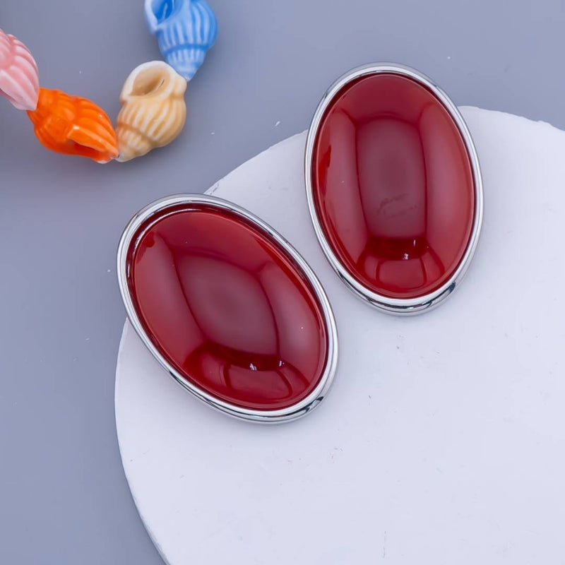 Aretes ovalados con piedras baño 18k