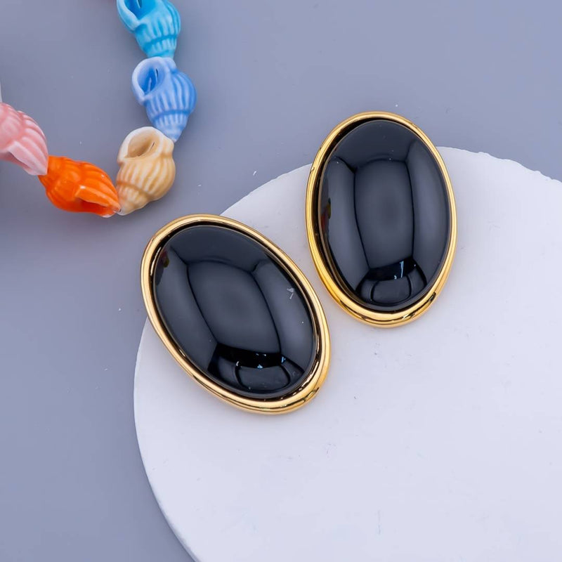 Aretes ovalados con piedras baño 18k