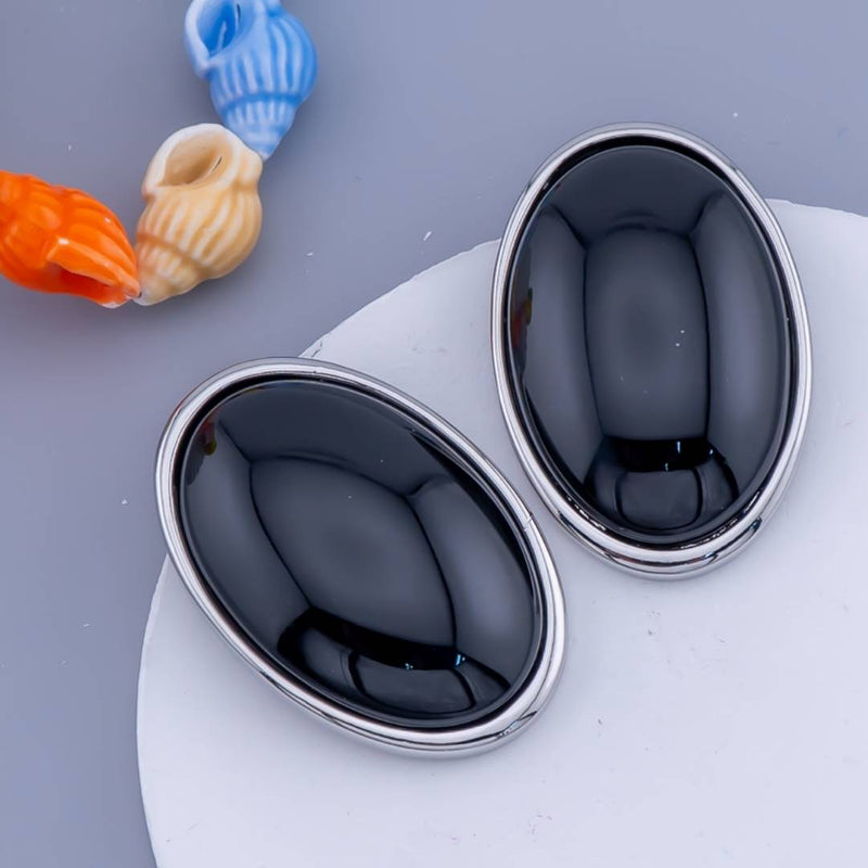 Aretes ovalados con piedras baño 18k