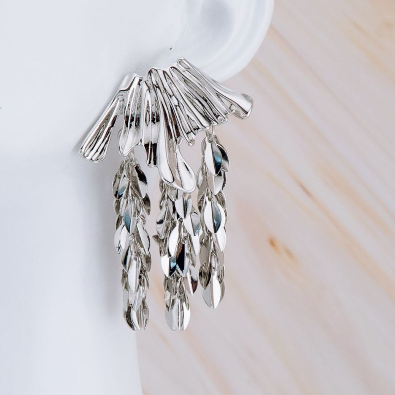 Arete tassel de hojas en baño 18k