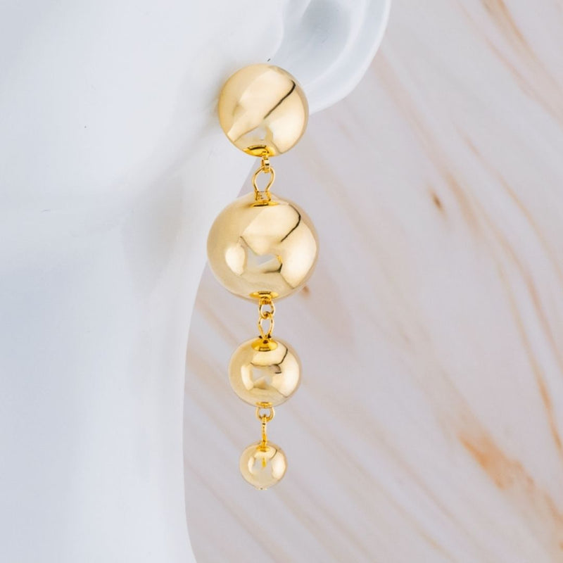 Aretes colgantes baño 18k