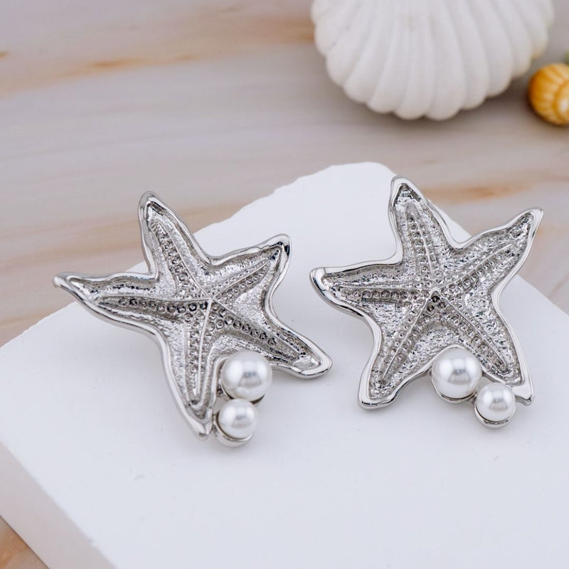 Aretes en tendencia chunky en forma de estrella baño 18k con perlas