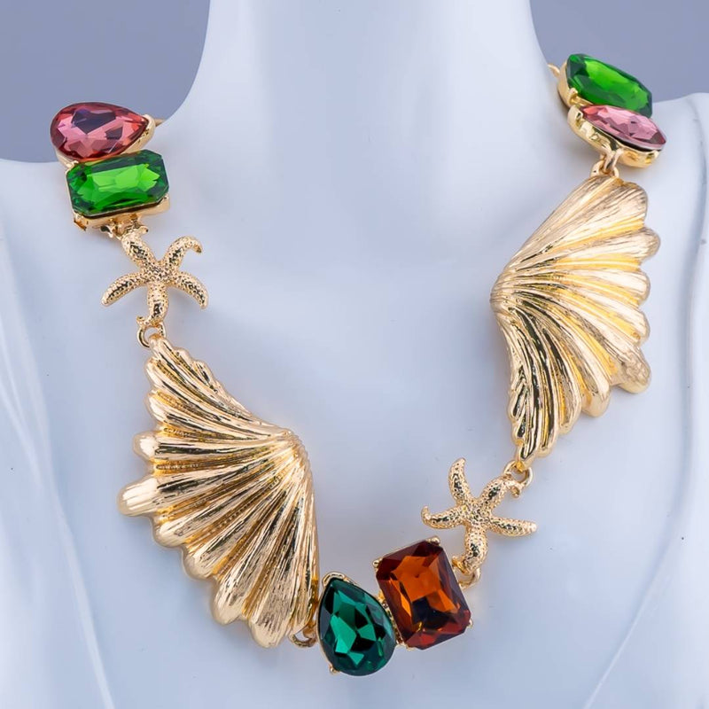 Collar chunky  espectacular con zirconias conchas y estrellas