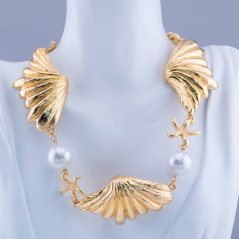 Collar chunky  espectacular con perlas conchas y estrellas