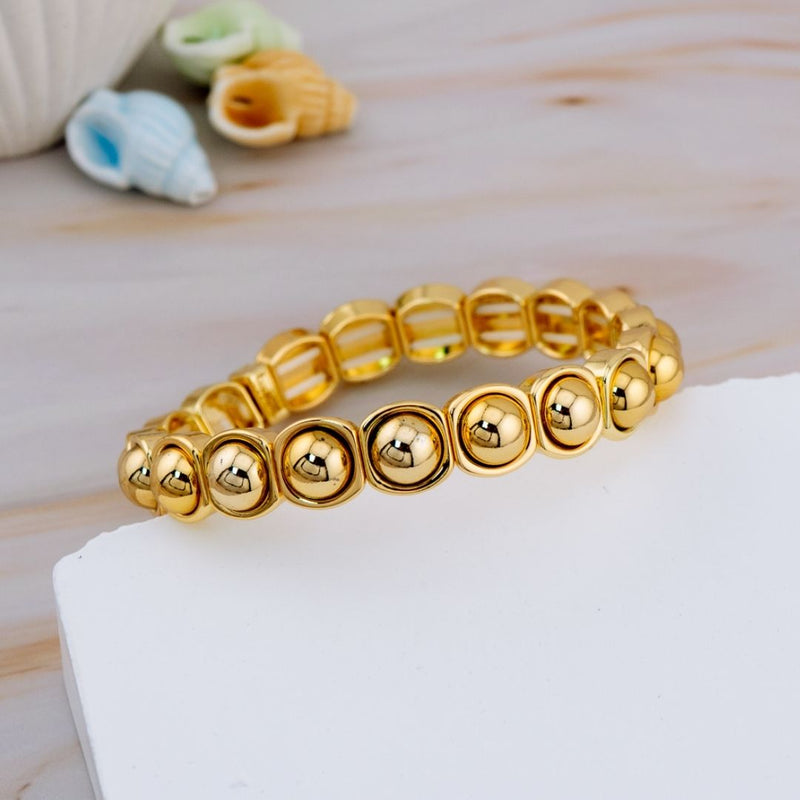 Pulsera elastica dorada baño 18k
