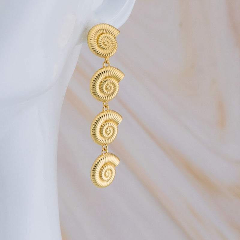 Aretes largos en tendencia caracol en forma de hoja baño 18k