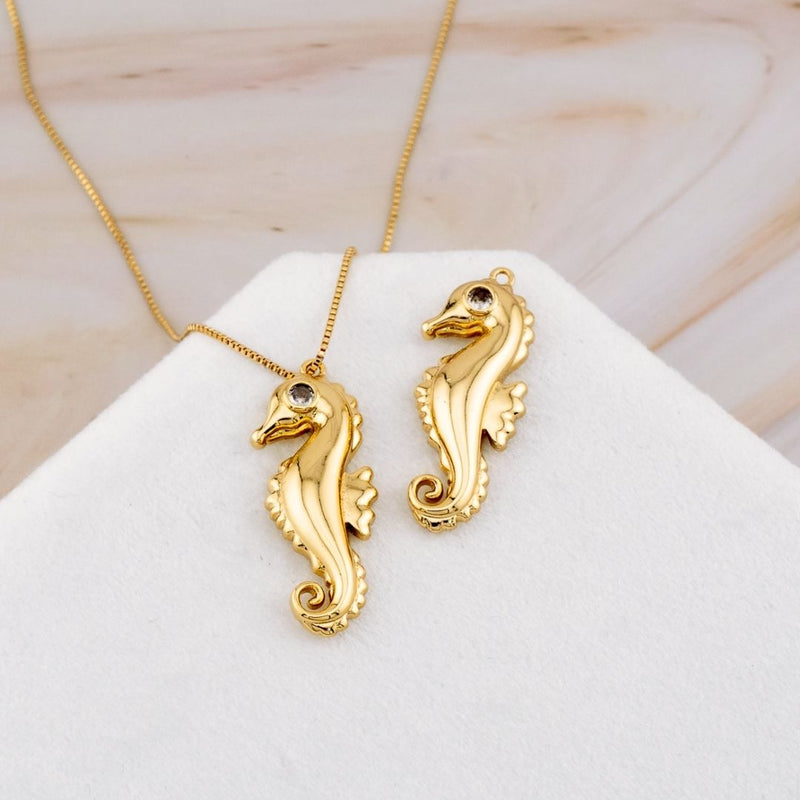 Dije caballo de mar baño 18k