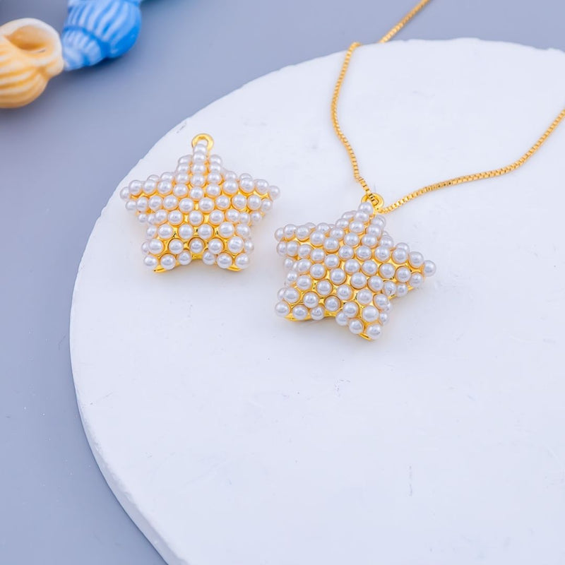 Dije micropave en forma de estrella de mar baño 18k y perlas