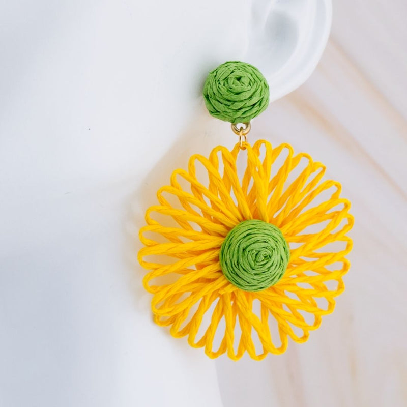 Aretes flor junco baño 18k