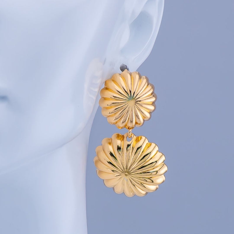Aretes flores colgantes baño 18k