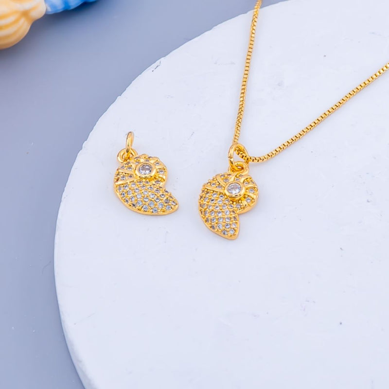 Dije micropave en forma de caracol baño 18k