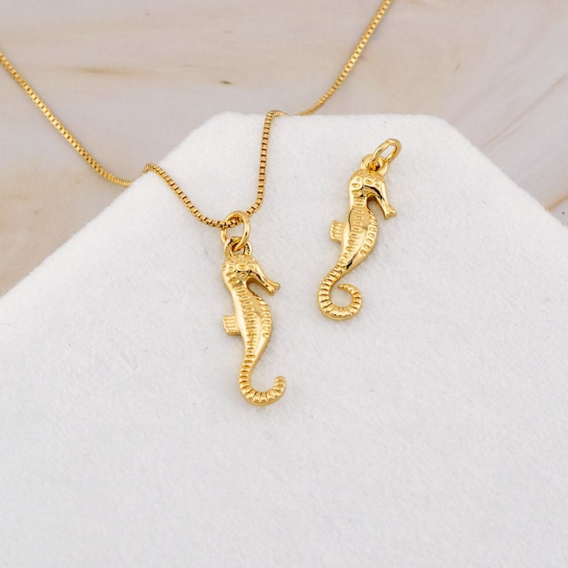Dije caballo de mar baño 18k