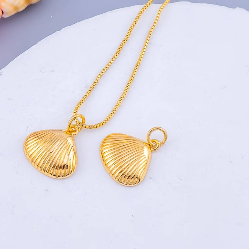 Dije concha baño 18k