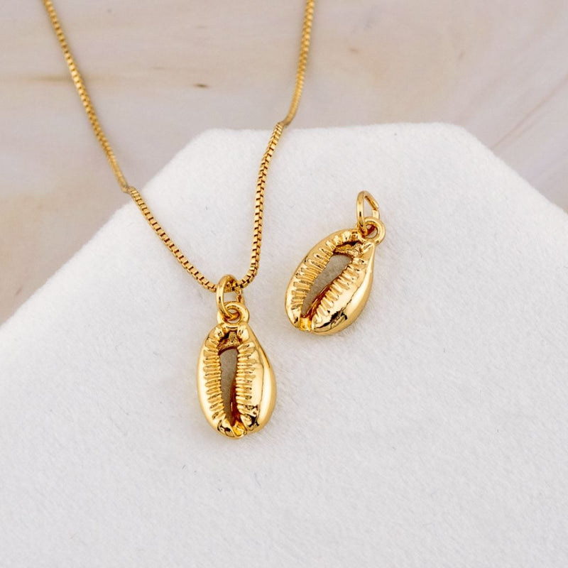 Dije concha de mar baño 18k