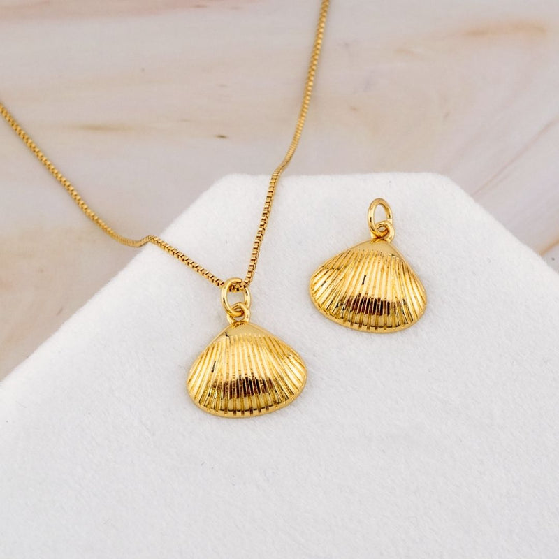 Dije concha de mar baño 18k