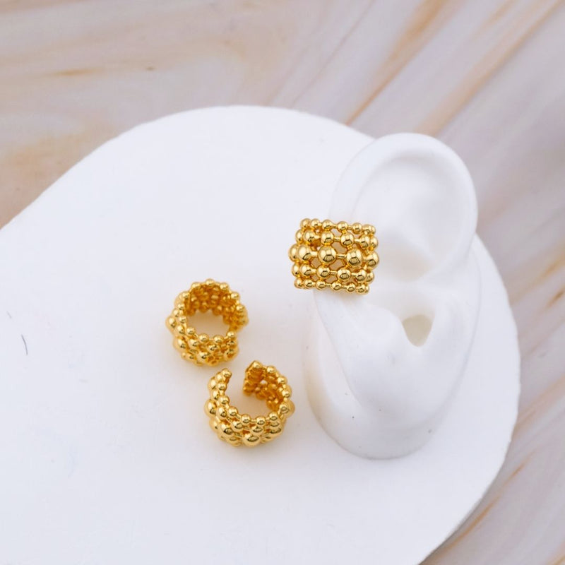 Arete ear cuff baño 18k