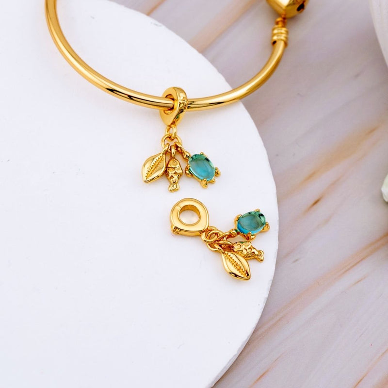 Charm con micropave estilo pandora con colgantes de tortuga, pez y concha baño 18k