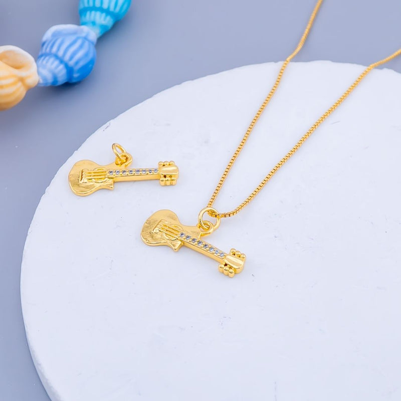 Dije micropave en forma de guitarra baño 18k