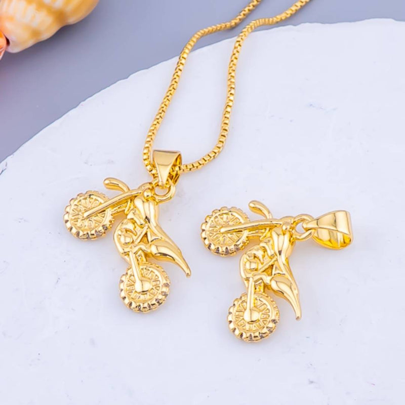 Dije motocicleta esqueleto baño 18k