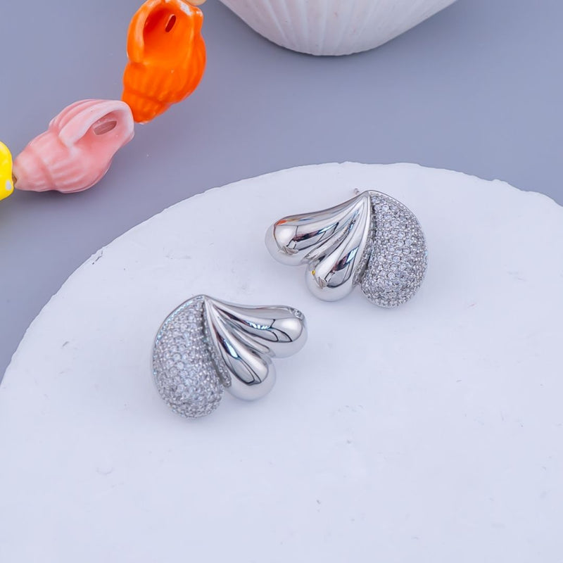 Aretes stus en forma de gota con zirconia y baño 18k