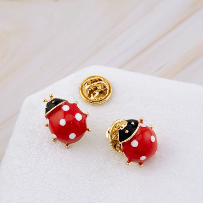 Pin de mariquita esmaltado baño 18k