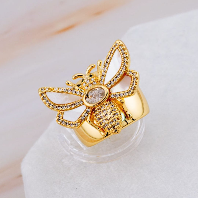 Anillo ajustable abeja con zirconias y madre perla baño 18k