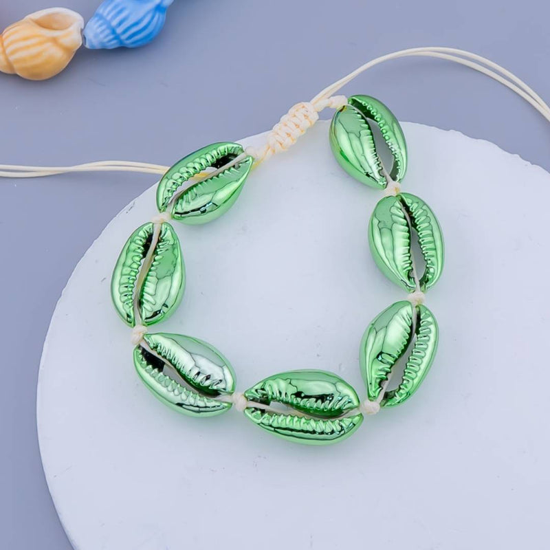Pulsera ajustable de conchas de mar e hilo