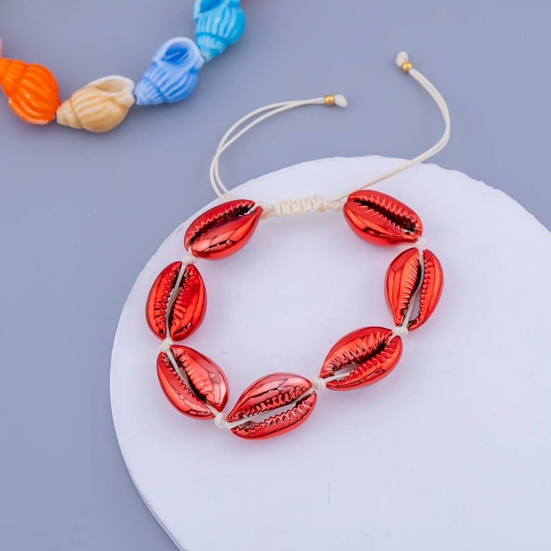 Pulsera ajustable de conchas de mar e hilo