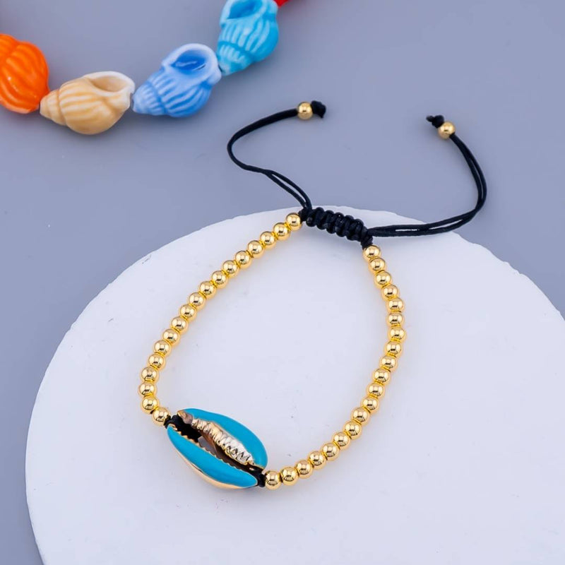 Pulsera ajustable de conchas de mar de hilo y bolitas en baño 18k