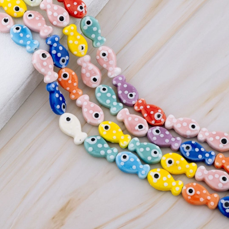 Piedra ceramica en forma de pez de mar multicolor