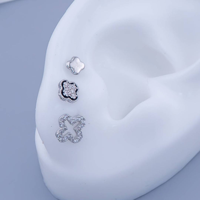 Set de 3 pares de Aretes piercing con zirconia trebol baño 18k