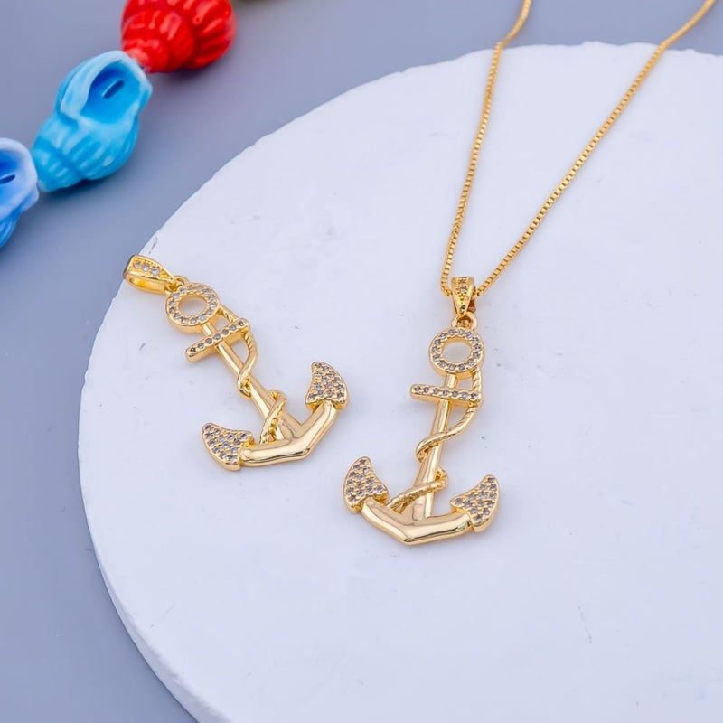 Dije micropave en forma de ancla baño 18k