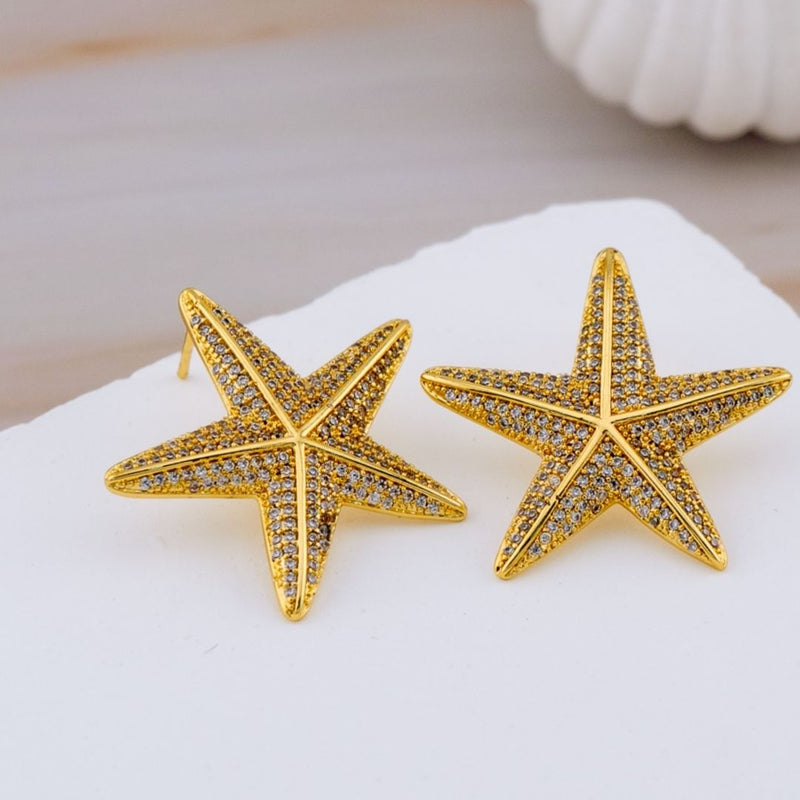 Aretes stud estrella con zirconia baño 18k