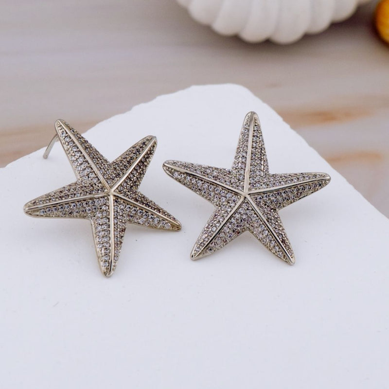 Aretes stud estrella con zirconia baño 18k