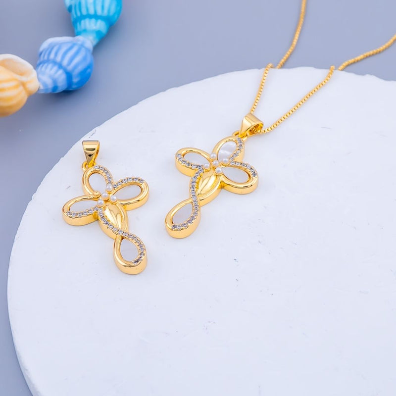 Dije cruz micropave y madre perla con baño 18k