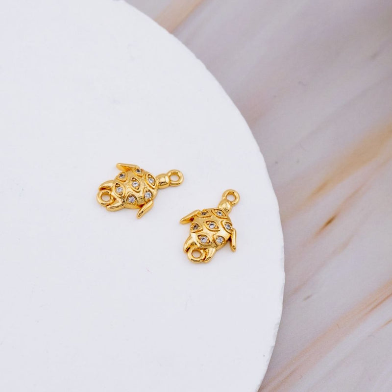 Enlace o conector micropave tortuga baño 18k