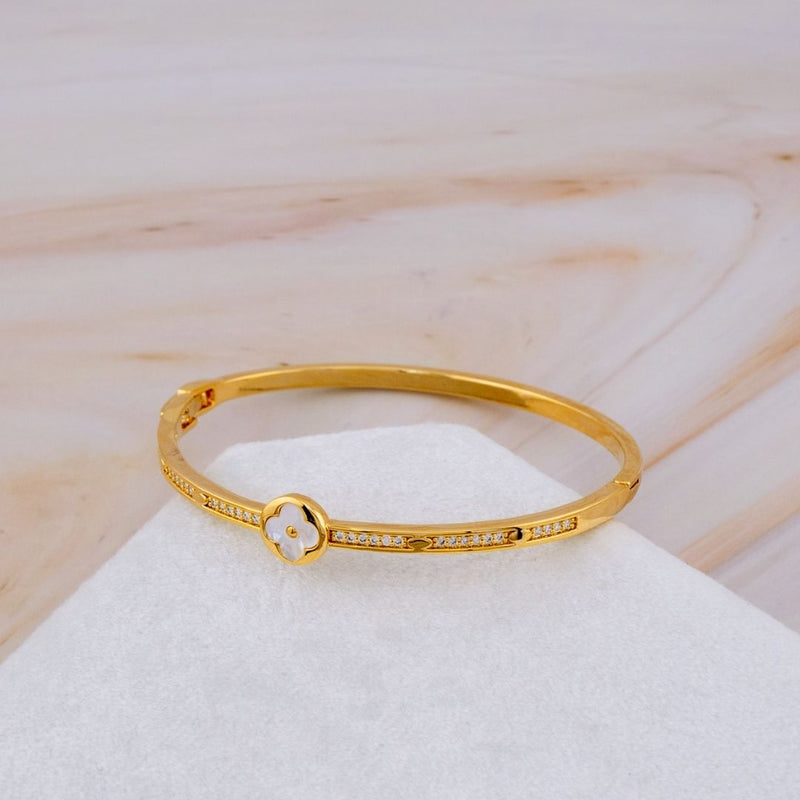 Brazalete trebol madre perla y zirconias baño 18k