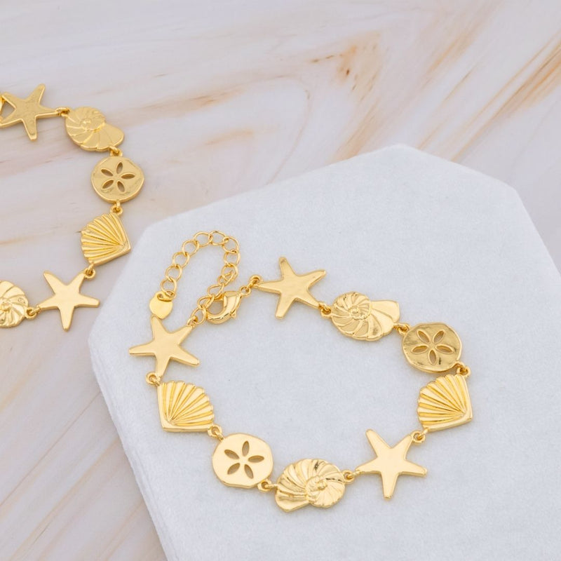 Pulsera mar estrella concha caracol baño 18k
