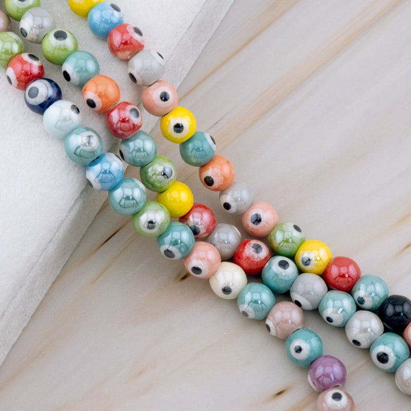 Piedra ceramica redonda con ojo turco multicolor 8mm